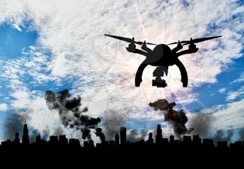 Silhouette flying reconnaissance drone over the city in smoke. Concept of military intelligence and information