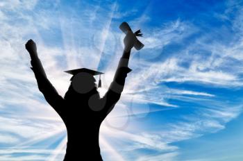 Graduate raised his hands to sky and holds diploma day. concept of education