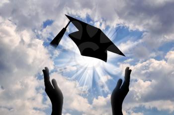Hands graduate cap throw up in sky. concept of education