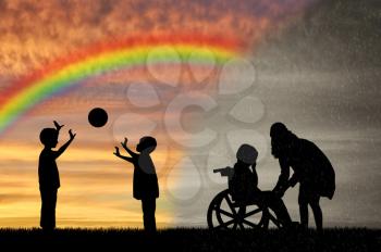 Disabled child in wheelchair crying and his mother near children play with ball and rainbow. Concept children disabled