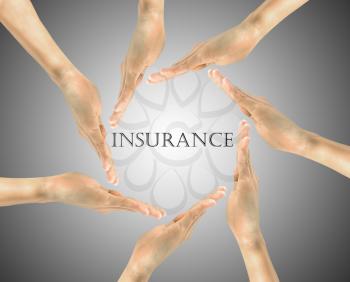 Insurance concept. Word insurance in the center of the hand