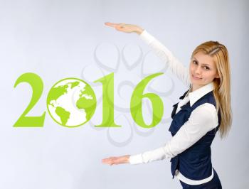 Business woman presents 2016. Business concept and globalization
