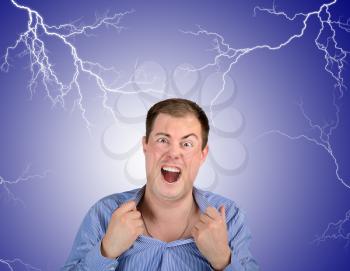 Annoyed man screaming on the background of electric discharges. The concept of emotions and feelings