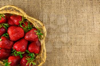 Juicy strawberries in a basket. design element