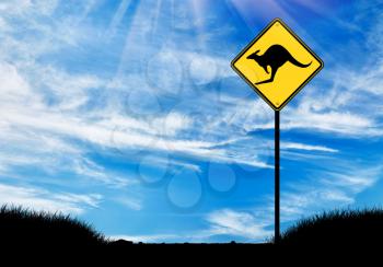 Silhouette of a kangaroo road sign against a beautiful sky