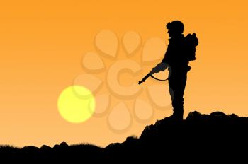 Silhouette of soldier with a gun on a background of sunset