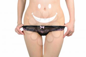 The concept of health. Smiley on the women's tummy