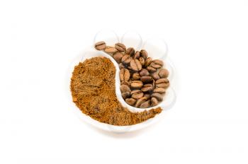 Roasted grain and ground coffee isolated on a white background