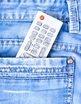 Remote control of the smart tv in the jeans pocket