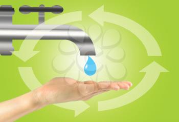Concept of water circulation. A drop of water falls into the hand of man
