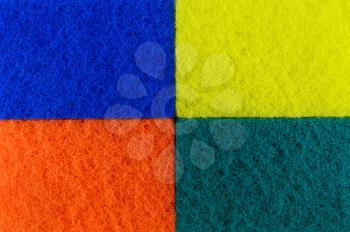 Colorful sponges for washing dishes. Background texture