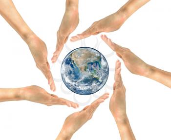 Concept of environmental protection. Planet earth in the center of the circle of human hands NASA