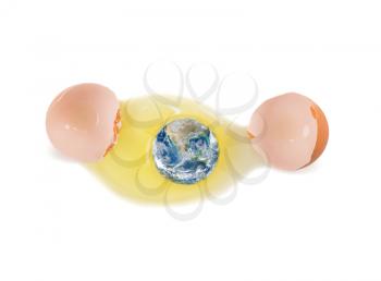 Concept of ecology. Planet earth in the broken egg