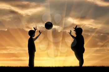Thick and normal boy and play ball on the background of sunset. obesity concept