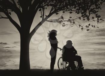 Disabled persons in wheelchair and nurse under tree near sea black and white. Concept of disability