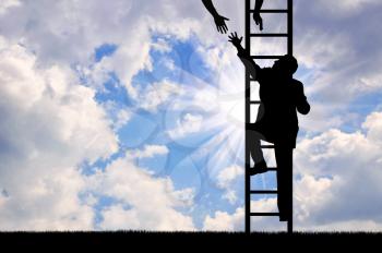 Businessman climbing stairs and a helping hand. Concept of helping