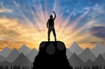 Silhouette happy climber on a mountain top. Concept of success and objectives