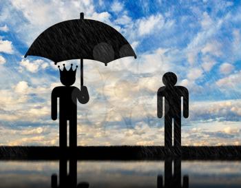 Concept of selfishness and greed. Man with a crown under an umbrella and a man in rain