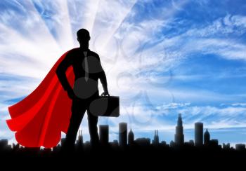 Superman businessman superhero. Silhouette of a confident superman businessman with a briefcase on a city metropolis background at dawn