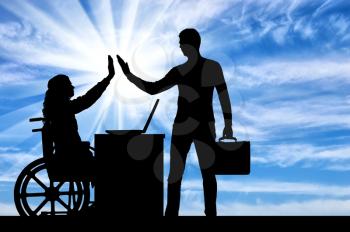 Worker woman a disabled person in a wheelchair with an employee at work. The concept of tolerance and equality for people with disabilities