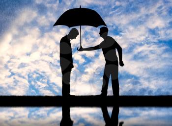 Altruist man gives his umbrella to another sad man standing in the rain. Altruism concept
