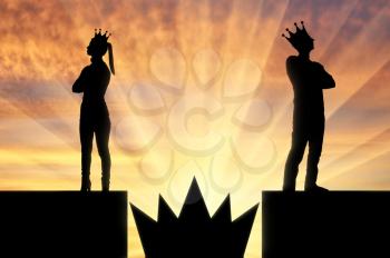 Big crown is like a spike trap between a selfish man and a woman with a crown on her head they stand with their backs to each other. Concept of selfishness and arrogance in the family