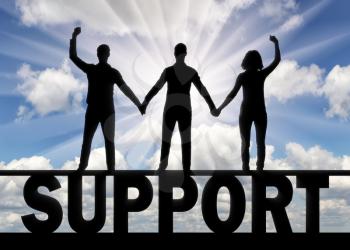 Silhouette of a group of people of three people holding hands stand on the word support. The concept of people's support