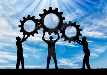 Silhouette of the three men holding the gears put them together in one gear. The concept of mutual benefit
