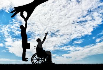 Employer hand chooses a healthy employee, not a disabled person in a wheelchair. The Concept of Discrimination and Inequality in the Employment of People with Disabilities