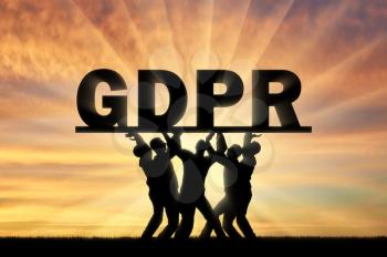 A group of people hold the word GDPR above them. Conceptual image about the law GDPR