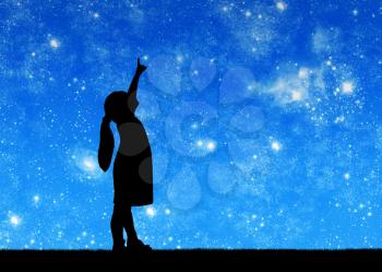 Silhouette, little baby girl looking at starry sky and showing thumb up. Conceptual image of a carefree childhood
