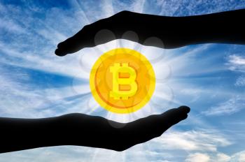 Bitcoin in the hands of man. The concept of crypto currency