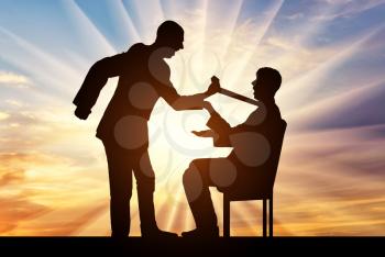 Workplace bullying concept. Silhouette of a boss aggressively holds a tie for an employee who sits on a chair against a sunset