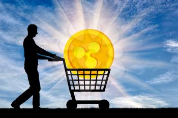 Silhouette of a man and a ripple in a grocery cart. The concept of purchasing crypto currency