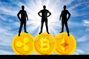 Three businessmen are standing on three coins of the crypto currency. The concept of business in the crypto currency