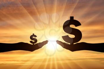 Silhouette of two hands, in one hand a large symbol of Dollar. In the second hand is a small symbol of the dollar. The concept is rich and poor. Social inequalities