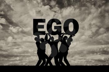 The silhouette of a selfish crowd holds the word ego. The conceptual scene of selfishness as a social problem