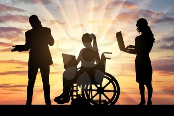 Silhouette woman disabled worker in wheelchair with laptop next to work team. Disabled working concept