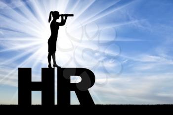 Silhouette of a woman standing on the letters HR and looking through binoculars looking for potential employees. Hiring concept