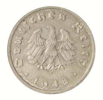 Close up of an ancient German coin of 1948.