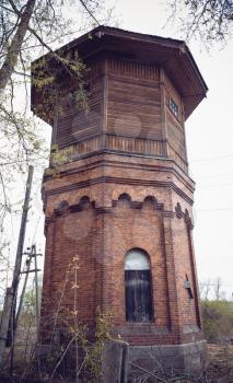 Old water tower for refilling steam locomotives water. Russia, Tver Region, Udomlya.