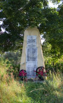 Village Agrafenino, Russia - August 14, 2013: Monument to the heroes who died defending their homeland from the Nazis in 1941-1945. Russia, Tver region, Udomlya District, the village Agrafenina . Focu