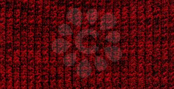 Beautiful red and black melange knitted background.