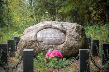 Village Poddube, Russia - October 1, 2017: Stone on the grave of the Russian artist Grigory Soroka.