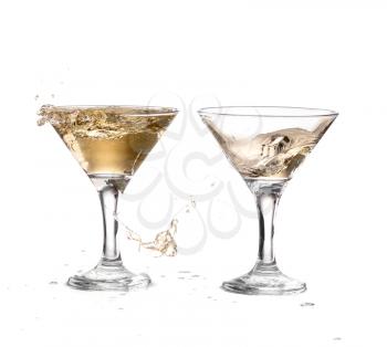 two wine swirling in a goblet martini glass, isolated on a white background