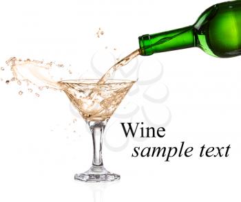 White wine pouring from the bottle intro the glass on white background(with sample text)