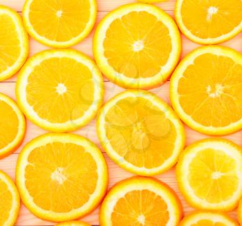 fresh, orange on a wooden background (seen from above)