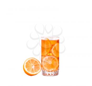 Amber cocktail in a glass isolated on a white background