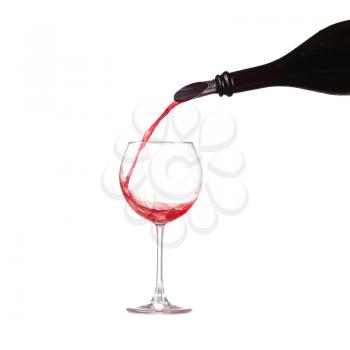 Wine in glass pouring from bottle and make splash, dispenser on the bottle