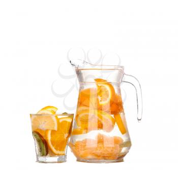 pitcher with a refreshing drink with lemon slices of orange and kiwi on white background